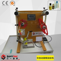 Semi - automatic wrap-around labeling machine