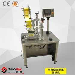 Semi - automatic curved bottle labeling machine