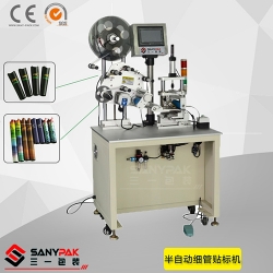 Semi-automatic tube labeling machine